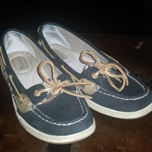 Black leather Sperrys with leopard